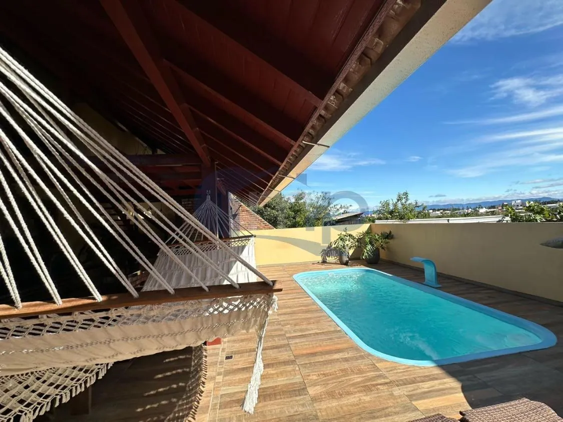 Imagem Casa a venda com 2 dormitorios em Capao do Cravo em Passo de Torres/RS