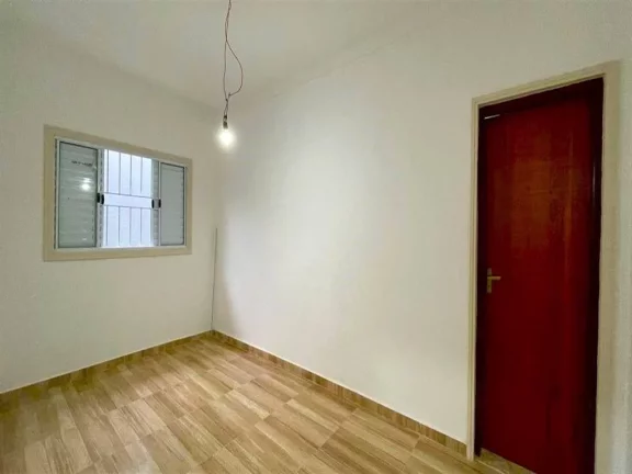 Imagem Casa com 2 dormitórios à venda, 130 m² por R$ 400.000 - Caiçara - Praia Grande/SP