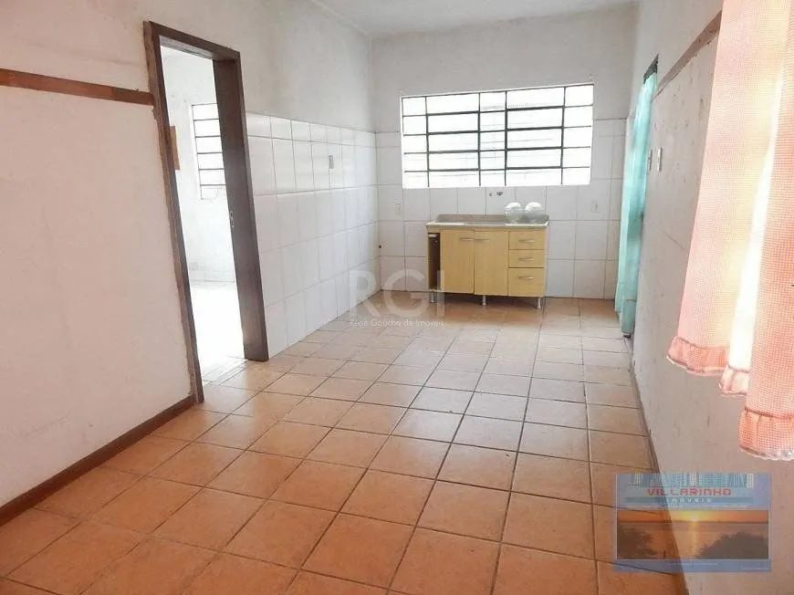 Imagem Casa para Venda - 120m², 3 dormitórios, 5 vagas - Nonoai