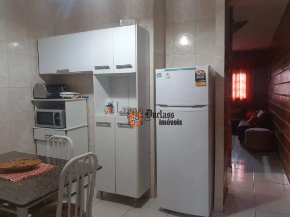 Imagem Sobrado com 2 dormitórios à venda, 70 m² por R$ 375.000 - Pontal de Santa Marina - Caraguatatuba/SP