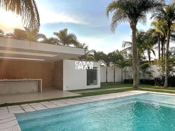 Imagem Imponente residência de luxo com 4 suítes na Barra da Tijúca, Rio de Janeiro - RJ: 3 salas, 6 vagas e 1.000m² de puro requinte!