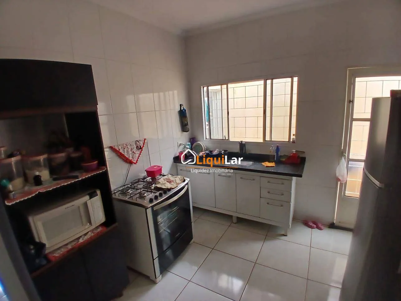 Imagem Casa à Venda Próxima à Avenida Lúdio Martins Coelho com Suíte, Energia Fotovoltaica e Acabamento de Primeira