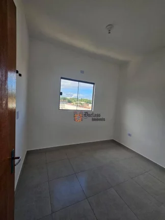 Imagem Sobrado com 3 dormitórios à venda, 100 m² por R$ 570.000,00 - Maracanã - Praia Grande/SP