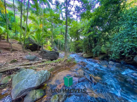 Imagem Chácara com 10 suítes e Cachoeira a venda, 9.104M² na zona rural de Guarapari.