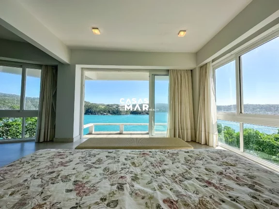 Imagem Luxuosa Casa Frente Mar em Búzios-Ferradura: 6 Suítes, Vista Deslumbrante, Piscina e Privacidade Total!