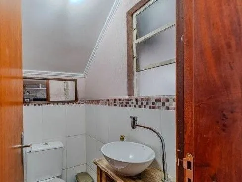 Imagem Casa em condomínio no bairro Santo Antômnio de 4 dormitórios e 2 vagas