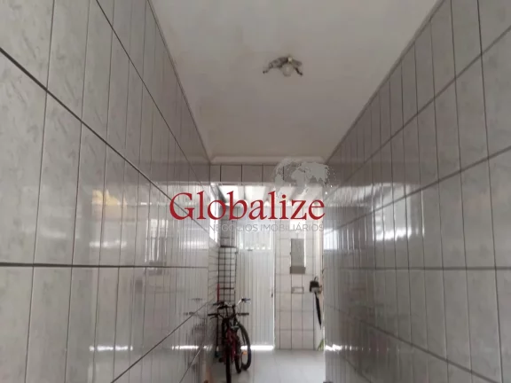 Imagem Casa térrea à venda com 125m², 2 quartos, churrasqueira, área coberta, vaga de garagem coberta por R$390.000,00 em Santos