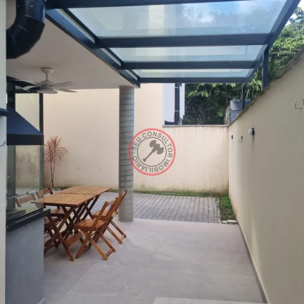 Imagem CASA DE ALTO PADRAO EM CONDOMINIO, COM 3 SUITES , AREA GOURMET PRIVATIVA , 3 VAGAS, BEM PROXIMO A PRAIA
