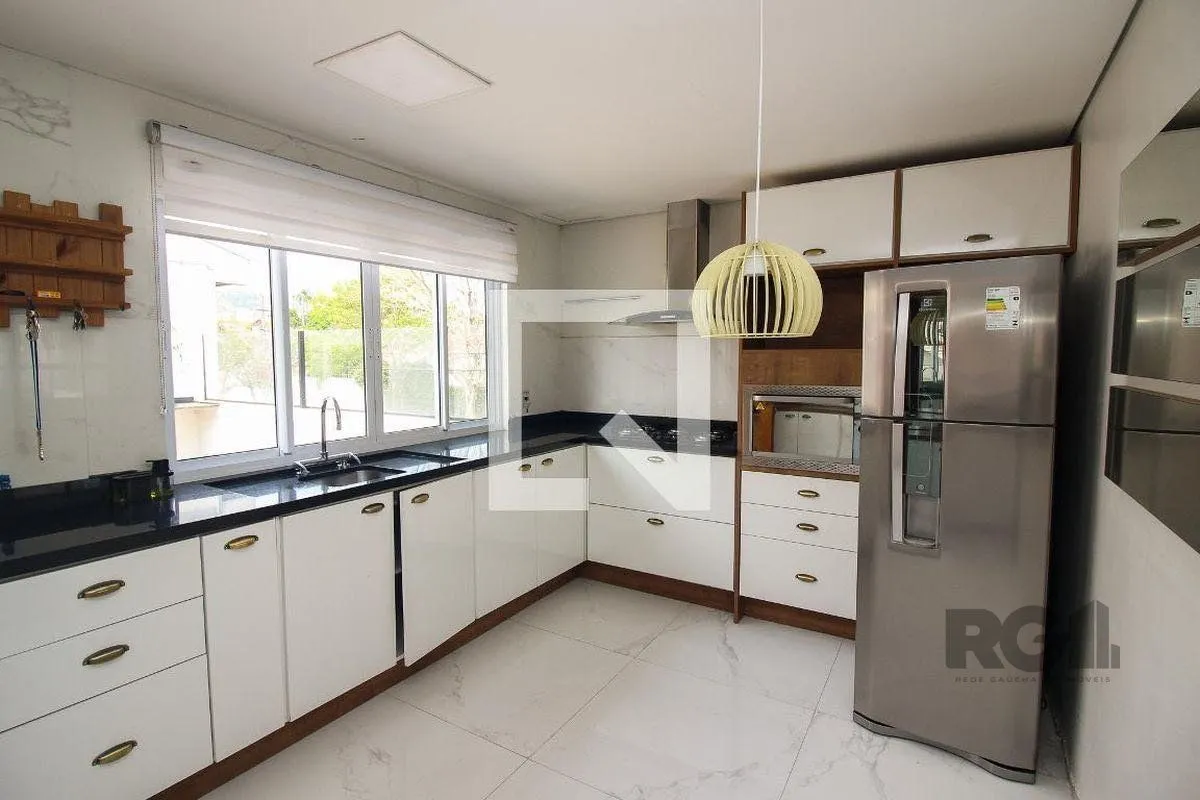 Imagem Casa 4 dormitórios à venda Partenon Porto Alegre/RS