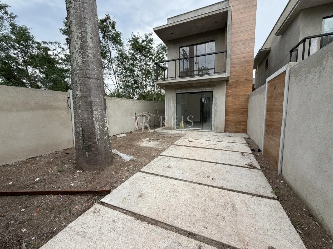 Foto do imóvel Casa para Venda em Rio das Ostras, Chácara Mariléa, 3 dormitórios, 2 suítes, 3 banheiros, 1 vaga em Rua Aristóteles da Cunha, 184 - Chácara Mariléa, Rio das Ostras - RJ