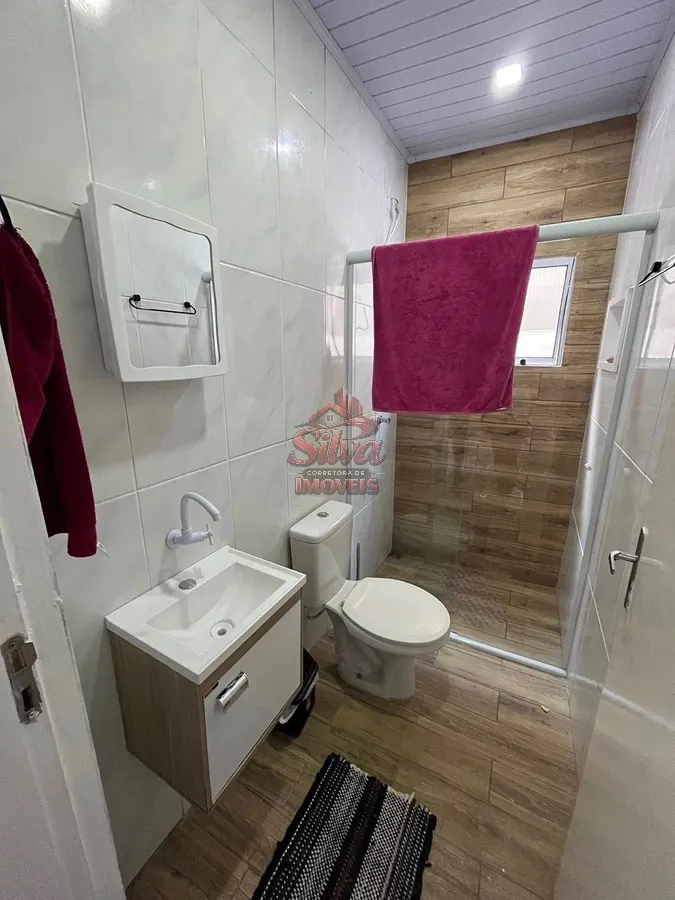 Imagem Casa 2 dormitórios com suíte a 580m do mar no Mariluz