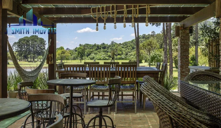 Imagem MANSÃO ESPETACULAR, COM VISTA PRO CAMPO DE GOLF. PISCINA,ADEGA, 9 SALAS.