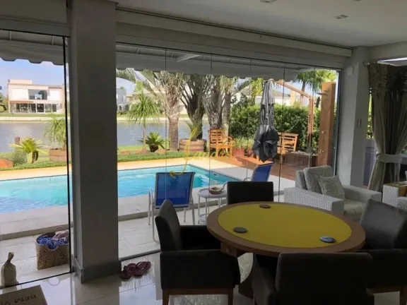 Imagem Sobrado beira de lago com piscina aquecida com 05 suítes