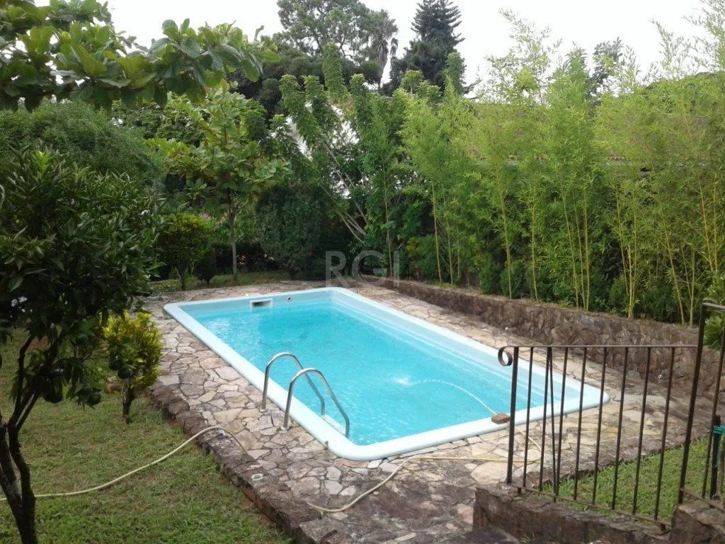 Imagem Casa para Venda - 311m², 4 dormitórios, sendo 2 suites, 4 vagas - Glória