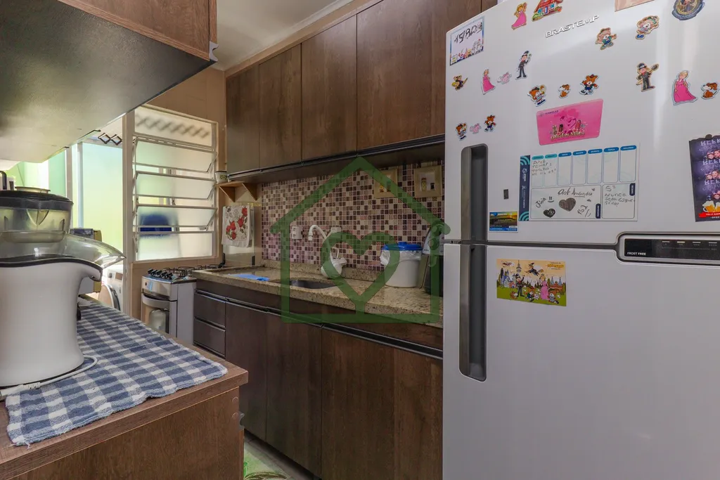 Imagem Apartamento no bairro Camaquã com 61m2 privativos, localizado a um lance de escada, composto por do...