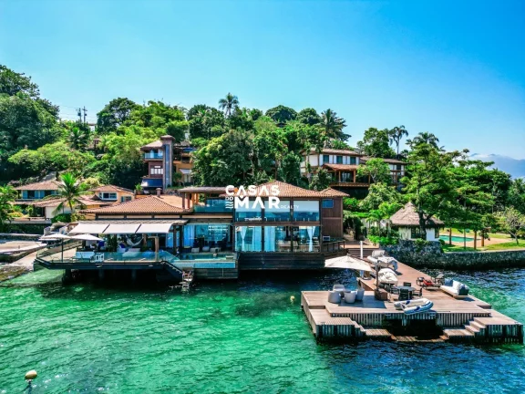 Foto do imóvel Casa de Luxo à Beira Mar em Angra dos Reis: 6 Suítes, 7 Salas, 950m² - Piscina, Churrasqueira e Deck Privativo