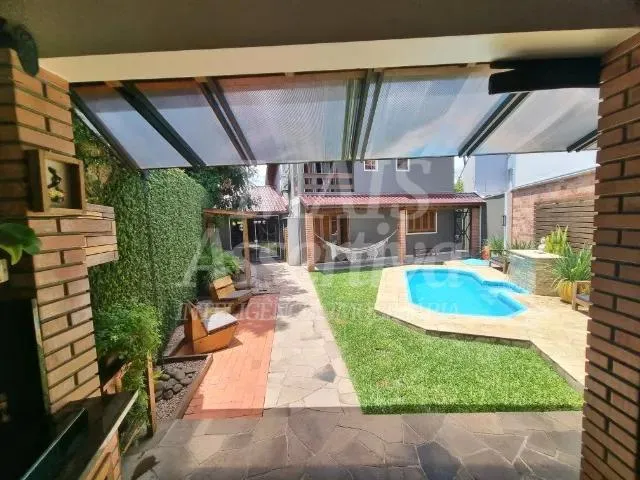 Imagem Excelente Sobrado à venda no bairro Nossa Sra. das Graças em Canoas - 2 Vagas