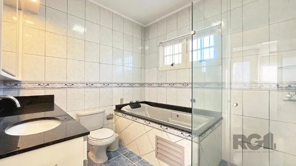 Imagem Casa de 3 dormitórios no bairro Cavalhada