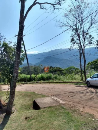 Imagem Casa com 2 dormitórios à venda, 113 m² por R$ 650.000 - Massaguaçu - Caraguatatuba/SP