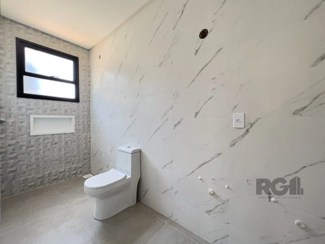 Imagem Casa para venda com 3 dormitórios, sendo 1 suíte no bairro Guarani
