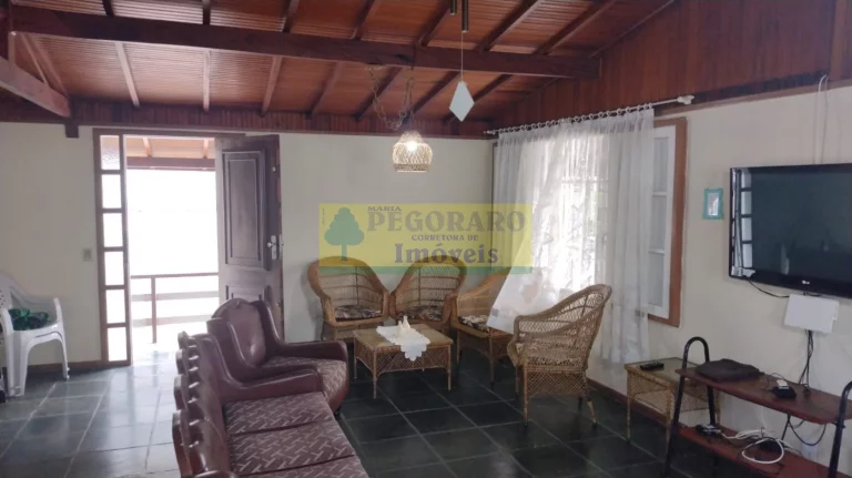 Imagem Imperdível Casa de 4 Quartos na Prainha, Caraguatatuba-SP: 2 Suítes, 2 Salas, 4 Banheiros, 4 Vagas de Garagem!