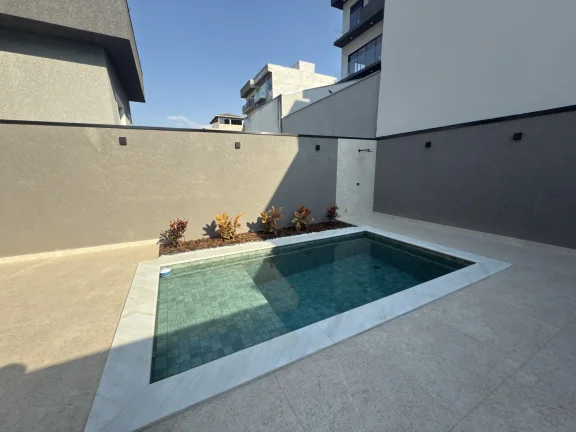 Imagem Casa a venda com 3 suítes, 4 vagas e piscina deslumbrante.