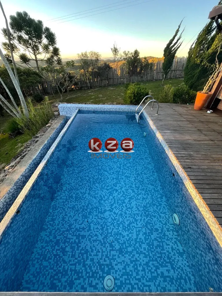 Imagem Imperdível Casa de Luxo com 4 Suítes e 15 Vagas de Garagem em Cunha-SP, Bairro Mato Escuro - 672m² de Pura Elegância!