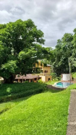 Imagem Sítio com 42000 m2, 06 suites, Piscina, Lago, Adega, Báia, Casa caseiro