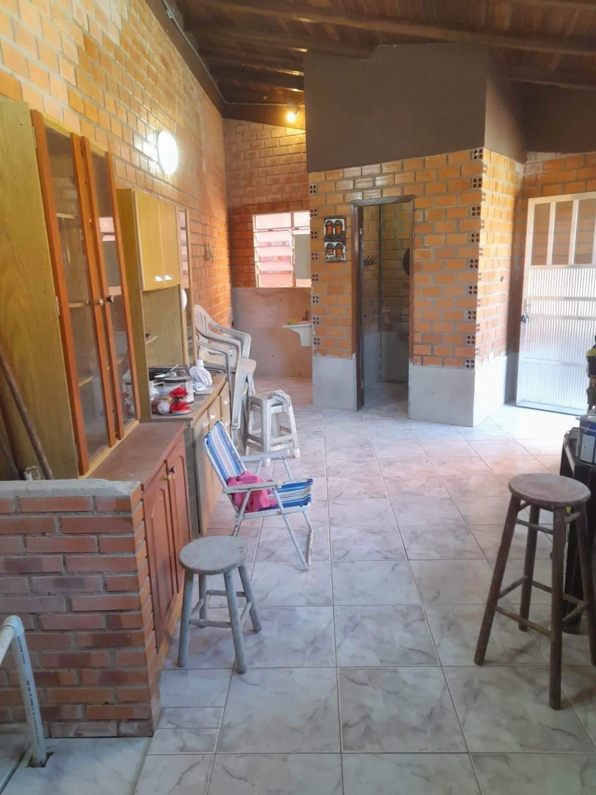 Imagem Casa à venda com piscina no bairro Glória, Zona Sul de Porto Alegre - 207m² construídos, pátio amplo e excelente potencial residencial