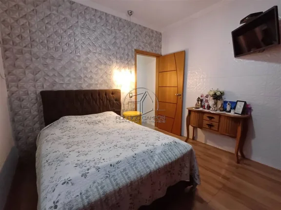 Imagem Espaçosa Casa Geminada no Mirim Praia Grande – 2 Quartos e Piscina