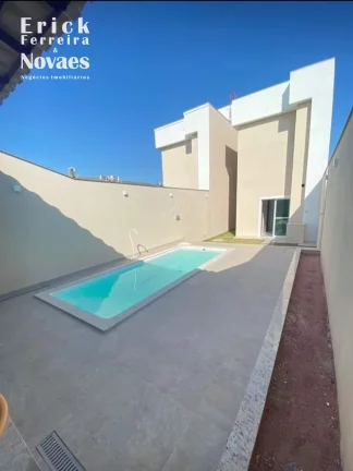 Imagem Casa a Venda na Praia do Morro-ES com 3 suítes sendo uma Suite master com Varanda, Sala de Estar e Jantar, quintal e Piscina e 2 vagas de garagem