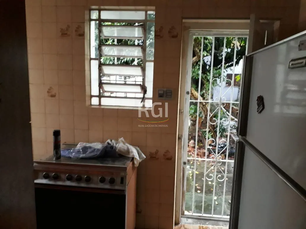 Imagem Casa para Venda - 415.8m², 5 dormitórios, 3 vagas - Menino Deus