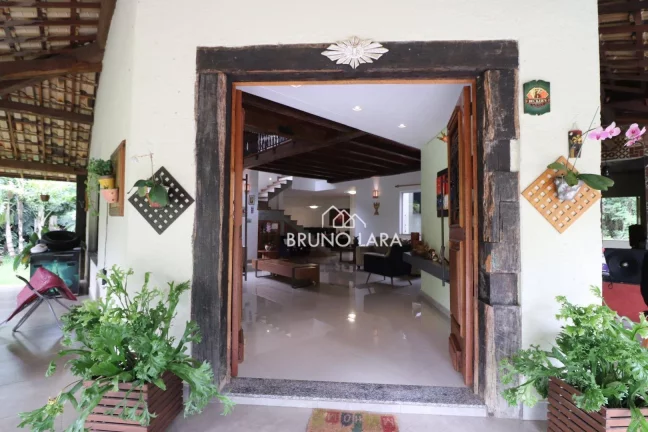 Imagem Casa à venda em Mário Campos Condomínio Serra dos Bandeirantes