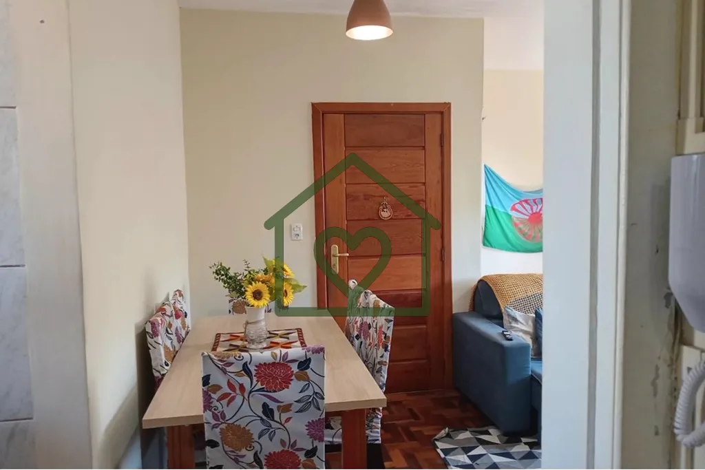 Imagem Descubra o seu novo lar no coração de Porto Alegre, no bairro Camaquã! Este encantador apartament...