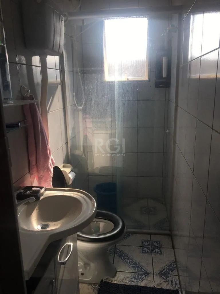Imagem Sobrado para Venda - 92m², 3 dormitórios, 2 vagas - Restinga Nova