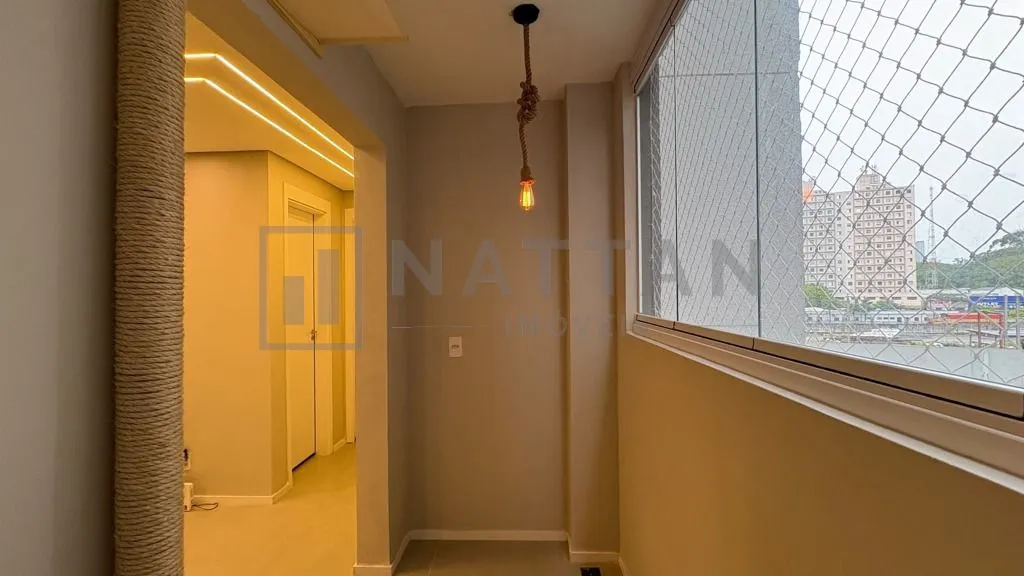 Imagem Apartamento com 2 dormitórios e suíte, 49,73 m², sacada e condomínio com piscina e academia