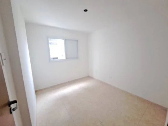 Imagem Apartamento com 2 dormitórios à venda, 56 m² por R$ 320.000 - Caiçara - Praia Grande/SP