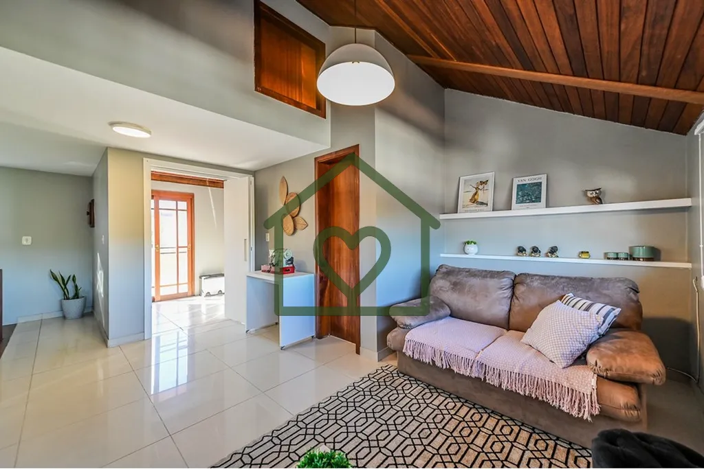 Imagem A casa dos seus sonhos te espera em um dos bairros mais encantadores de Porto Alegre! Situada no bai...