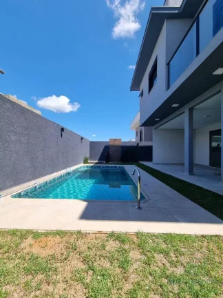 Imagem Casa 3 suítes e 4 vagas garagem, piscina , Condomínio Terras de Atibaia 1