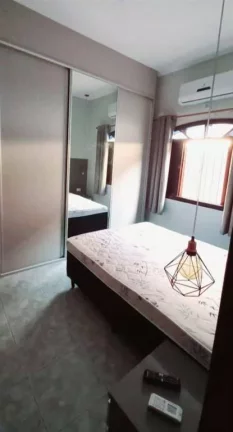 Imagem Casa com 2 dormitórios à venda, 56 m² por R$ 410.000 - Vila Caiçara - Praia Grande/SP
