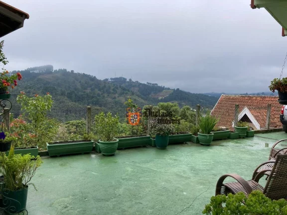 Imagem Sobrado com 4 dormitórios à venda, 259 m² por R$ 1.200.000,00 - Jardim Guararema - Campos do Jordão/SP