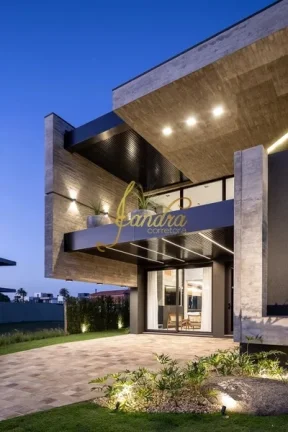 Imagem Casa condomínio com 05 suites e piscina beira de lago