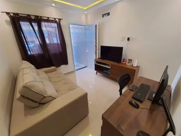 Imagem Casa com 2 dormitórios à venda, 70 m² por R$ 398.000 - Caiçara - Praia Grande/SP