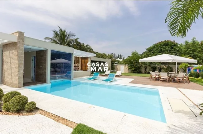 Imagem Imponente mansão de luxo na Barra da Tijúca: 5 quartos, 4 suítes, 3 salas, 7 banheiros, 2 vagas de garagem, 920m² de área. Venda!