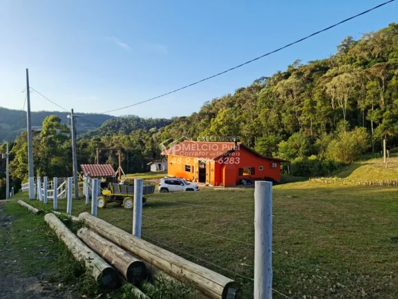 Imagem Propriedade rural de sítio e alto padrão com negócio de locação de cabanas. São 13 hectares escritura pública 05 cabanas 01 sede