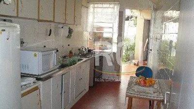 Imagem Casa para Venda - 125m², 3 dormitórios, 5 vagas - Menino Deus