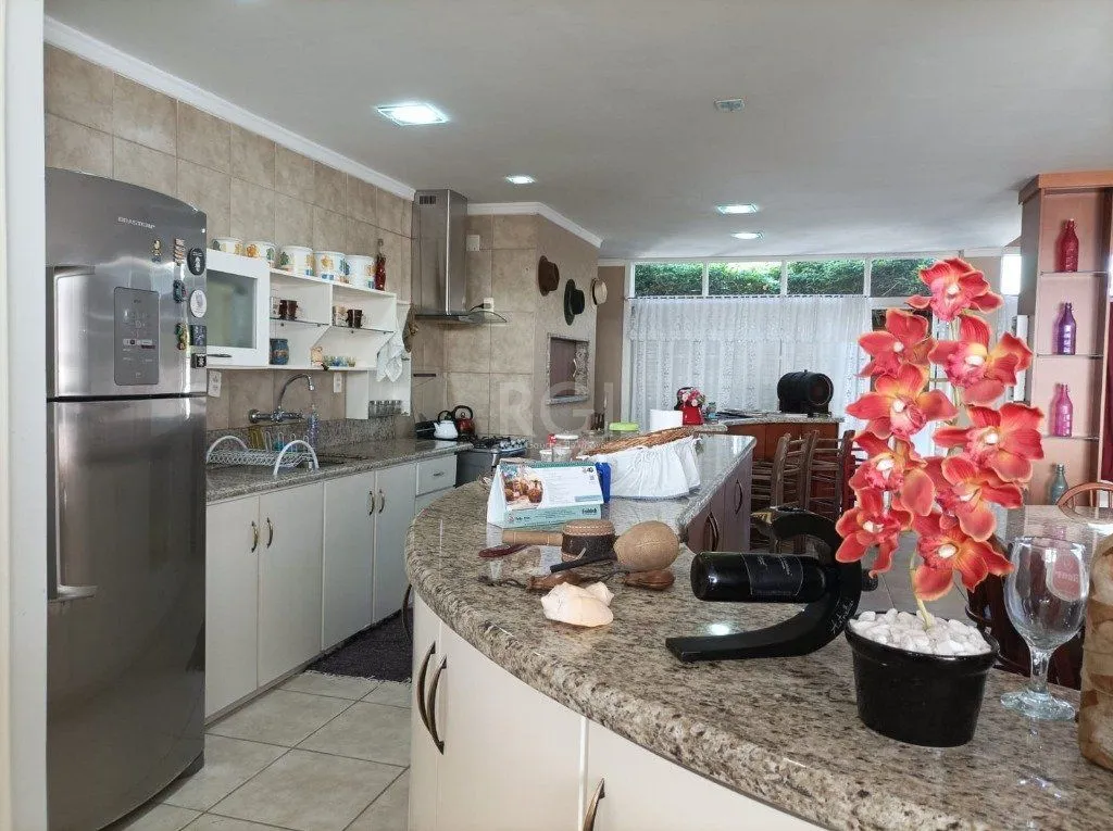 Imagem Casa para Venda 3 dormitórios 2 vagas - Capão Novo