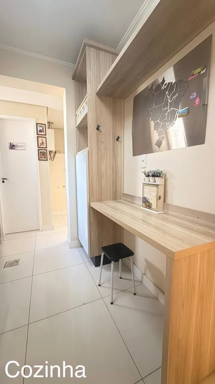 Imagem Apartamento de 2 quartos, suíte e 1 vaga de garagem no bairro Menino Deus em POA