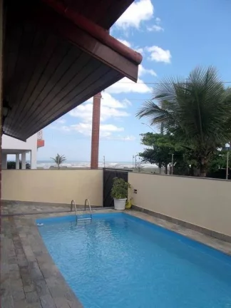 Imagem CASA COM PISCINA PERTINHO DA PRAIA