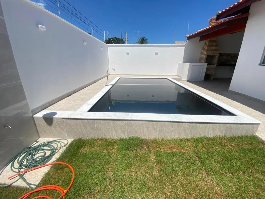 Imagem LINDA CASA NOVA COM PISCINA A 520 METROS DO MAR NO BOPIRANGA